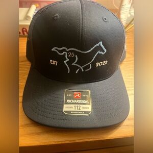 Richardson Navy Blue Trucker Hat with Embroidered Design